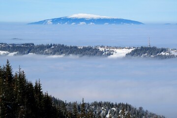 Panorama from trail to Hala Gasienicowa in Tatra Mountains in winter scenery. Babia Gora Peak on...