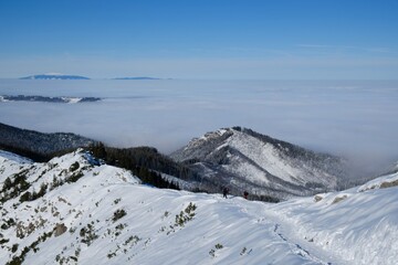 Panorama from trail to Hala Gasienicowa in Tatra Mountains in winter scenery. Babia Gora Peak on...
