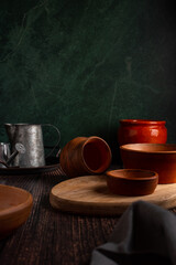 clay dishes on a wooden table