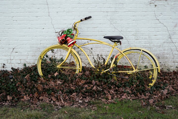Yellow bicycle decorated for Christmas