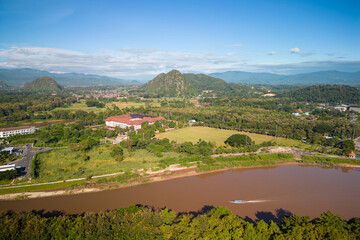 Aerial view of drone flying above Kok River, Chiang Rai Province, Thailand