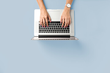 Woman working in modern office. Top view