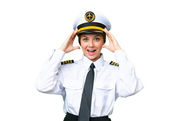 Airplane pilot woman over isolated chroma key background with surprise expression