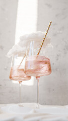 Wine glasses with straw and candy cotton 