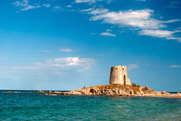 Fototapeta na wymiar Sardegna, vista della costa e dell'antica torre di Barì, a Barisardo, Italia, Europa 