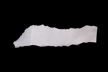 White torn paper piece isolated on black background