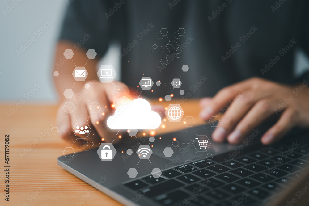 Poster A businessman is accessing the cloud computing system, big data, the internet of things, business processes, and various storage systems via a laptop..