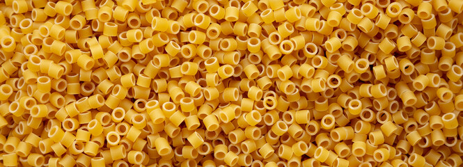 Raw Ditalini Pasta background, top view.