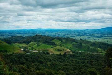 Fototapeta na wymiar The Kaimai Range is a mountain range in the North Island of New Zealand. Beautiful green mountain landscape with forests and meadows
