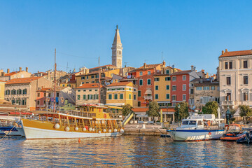 Fototapeta na wymiar Morning view to Rovinj marina and Rovinj old town, popular travel destination in Istrian county of Croatia