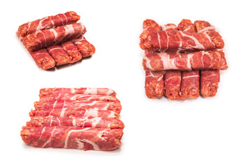 Chevapchichi in bacon isolated on white background.