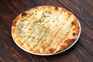 pizza on the wooden background