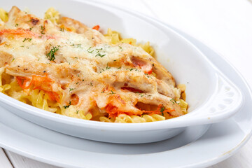 roasted vegetables with meat and cheese