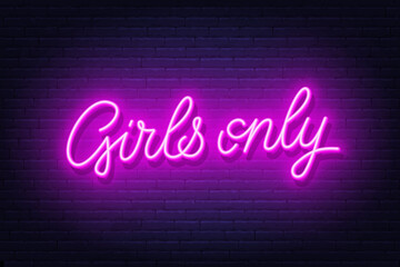 Girls Only neon sign on brick wall background.