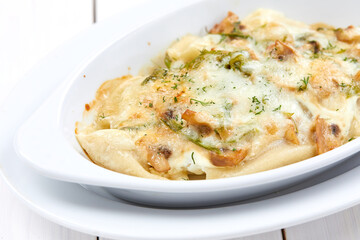 roasted vegetables with meat and cheese