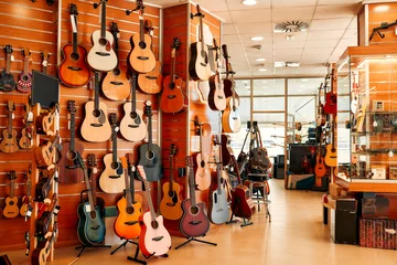 Deurstickers Muziekwinkel In a musical instrument store
