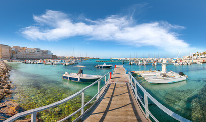 Obraz premium Breathtaking view on harbour of Otranto in Italy with lots of boats and yachts. Italian vacation.