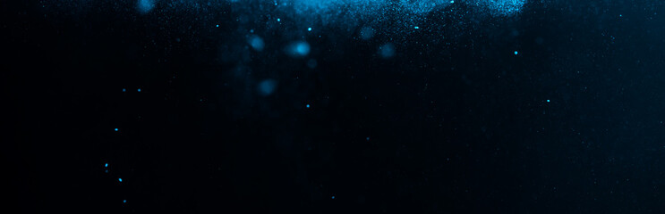 Abstract Blue bokeh defocus glitter blur background.