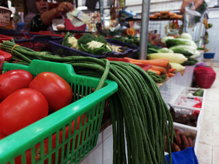 Kacang panjang or Long green beans, also called as the asparagus bean, yardlong bean, pea bean, long-podded cowpea, Chinese long bean, snake bean, bodi, and bora display at traditional market
