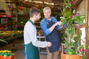 Flower shop owner in training as a florist