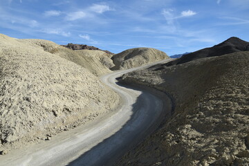 Landscape in the Death Valley National Park: mountain road in the Twenty Mules Team Canyon