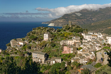 Fototapeta premium View of the village of Nonza with its Genoese tower, Cap Corse in Corsica, France
