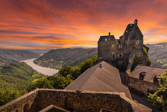 Landscape with Aggstein castle ruin and Danube river at sunset in Wachau walley Austria.