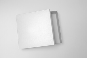 White textured opened box, gift mockup on white background.High resolution photo. Blank White Product Package Box Mock-up. Container, Packaging Template on white. Cardboard box.