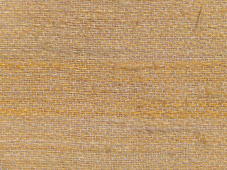 Texture of the yellow fabric of knitwear. textile  background