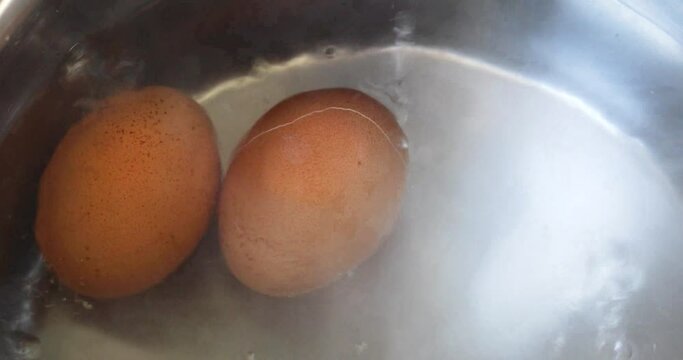 boil two eggs in boiling water in a metal saucepan. Economic crisis