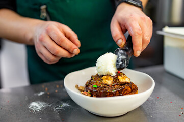 chef cooking dessert in the kitchen