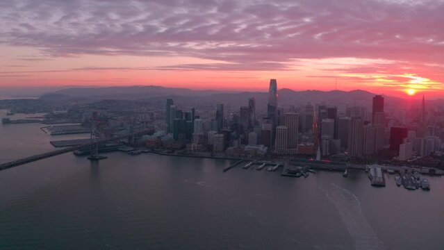Establishing aerial shot over San Francisco bay at sunset
