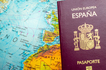 World map of Spain with passport on top. Spain adventure concept with passport