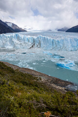 The famous glacier and natural sight Perito Moreno with the icy waters of Lago Argentino in Patagonia, Argentina, South America 