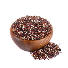 Quinoa seeds in wooden bowl, isolated on white background. Mix of white, red and black quinoa.