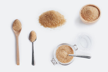 nature brown cane sugar on white background