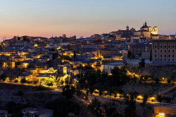 Obraz premium Views at night of Toledo. It is a city and municipality of Spain, capital of the province of Toledo in the autonomous community of Castilla–La Mancha. Toledo was declared a UNESCO World Heritage Site.