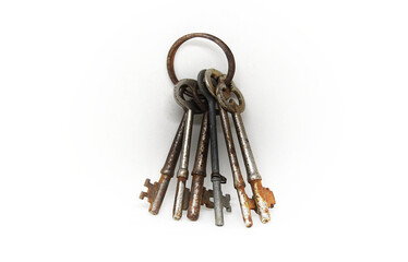 A bunch of rusty antique keys on a ring