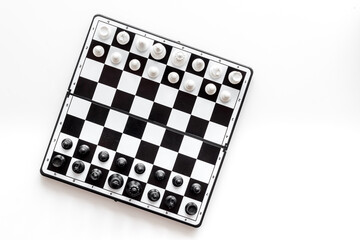 Business strategy and competition as chess game. Chess board top view