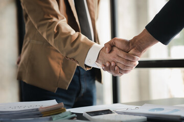 Business investor group holding hands, Two businessmen are agreeing on business together and...