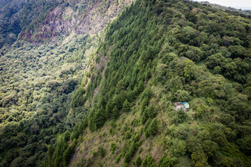 Stunning green mountainous landscape in Africa. Crater Lake Ngosi