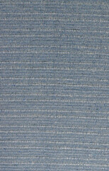 Cotton textile gray material close-up abstract defocused background.