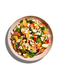 Fotobehang Isolated summer peach and cheese salad with mint, top view © Maria Shchipakina