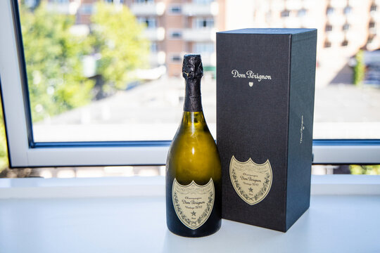 Bottle of french vintage champagne don perignon on windowsill