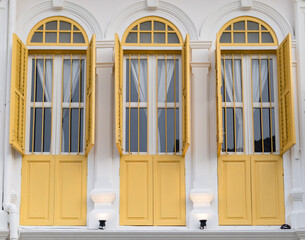Old Town, Phuket, Thailand october 30, 2022. three big yellow windows