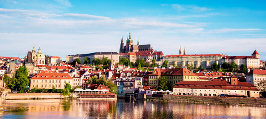 Obraz premium The beautiful landscape of the old town and the Hradcany (Prague Castle) with St. Vitus Cathedral and St. George church in Prague, Czech Republic. amazing places. popular tourist atraction