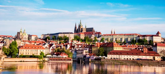 Zelfklevend Fotobehang The beautiful landscape of the old town and the Hradcany (Prague Castle) with St. Vitus Cathedral and St. George church in Prague, Czech Republic. amazing places. popular tourist atraction © anko_ter