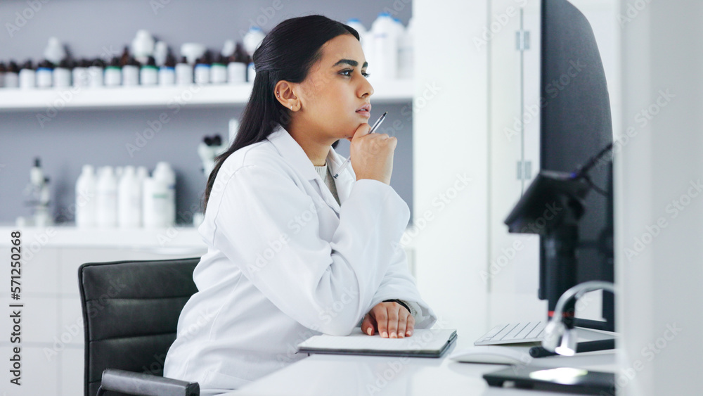 Poster Young scientist using a computer and microscope in a lab. Female pathologist analyzing medical samples while doing experiments to develop a cure. Microbiologist conducting forensic research