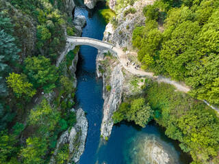 Le pont du diable or Devil Bridge ain Thueyts village in the Ardeche department in southern France. - obrazy, fototapety, plakaty