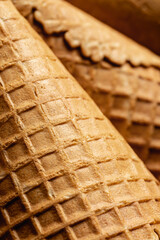 Ice cream cone close-up, waffle cone texture.